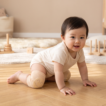 赤ちゃん用ひざ当て – 滑り止め付き・にこにこ顔デザイン