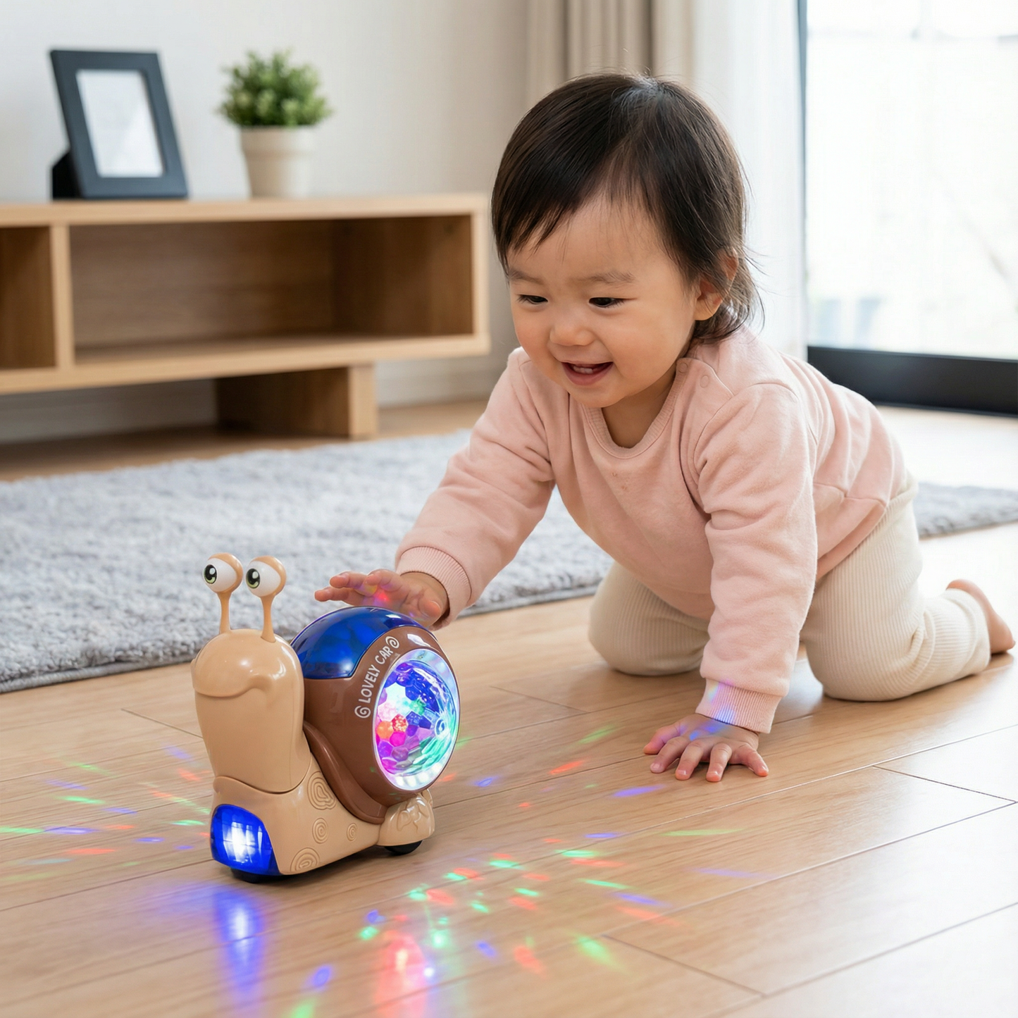 光って音楽が流れる はいはい用 おもちゃのカタツムリ